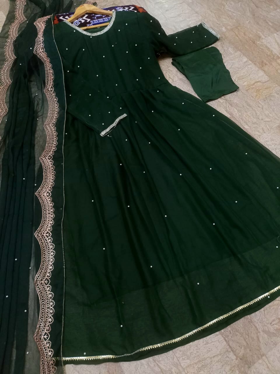 Women pearls and lace work long flare chiffon maxi with embroidered pearl dupatta and crepe trouser 3 piece stitched suit