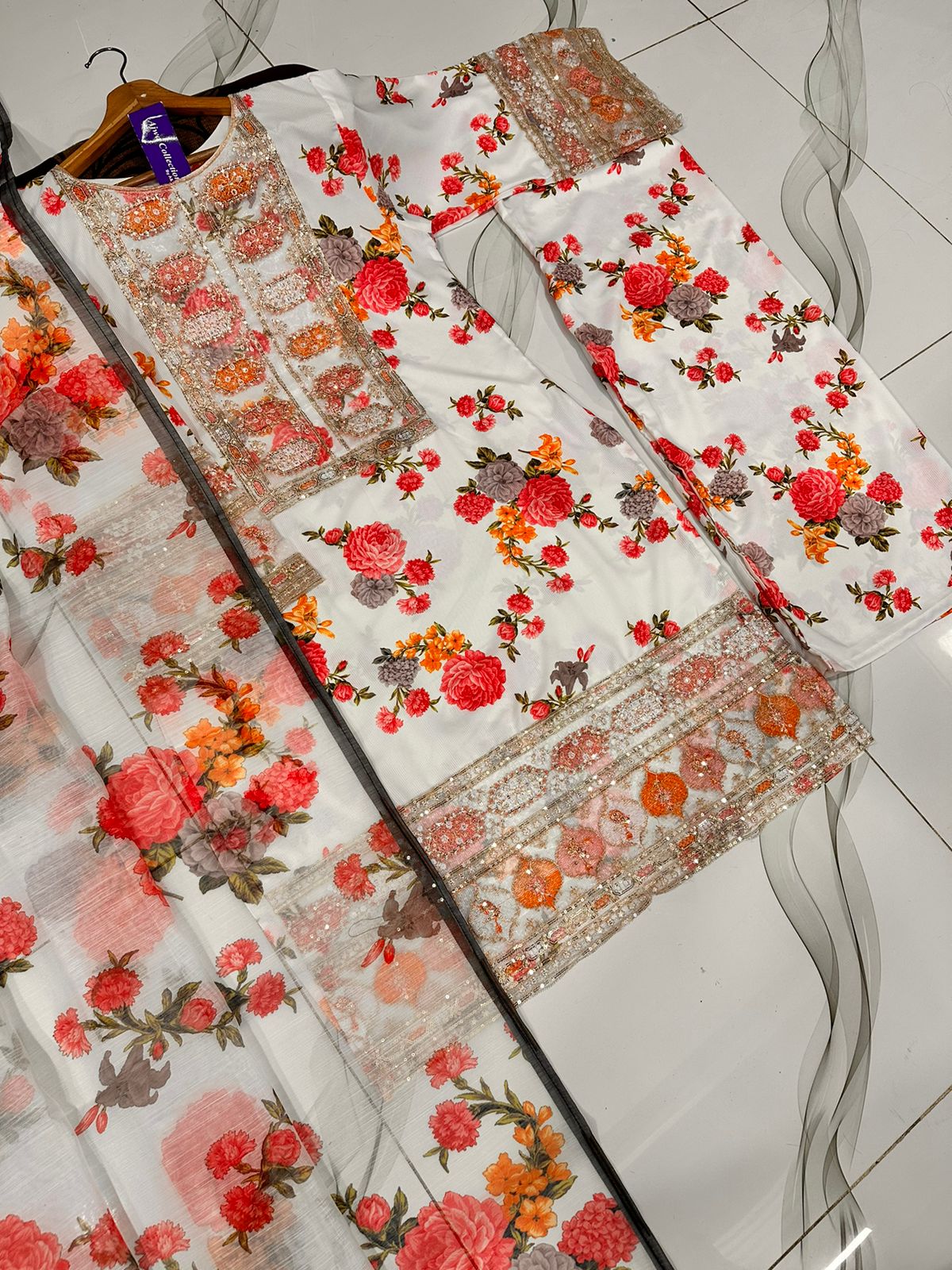 Women multi patched embroidered long shirt suit with printed flapper and digital dupatta 3 piece stitched dress